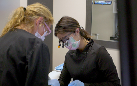 two doctors performing procedure