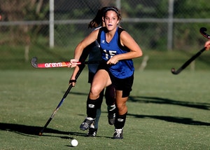 A young lady playing outdoor sports, a common cause of dental emergencies in Solana Beach.
